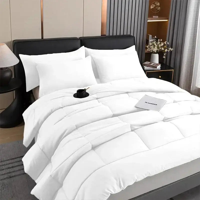 White quilted duvet set by decorbites with plush soft texture clean lines for all-season use in queen and king size