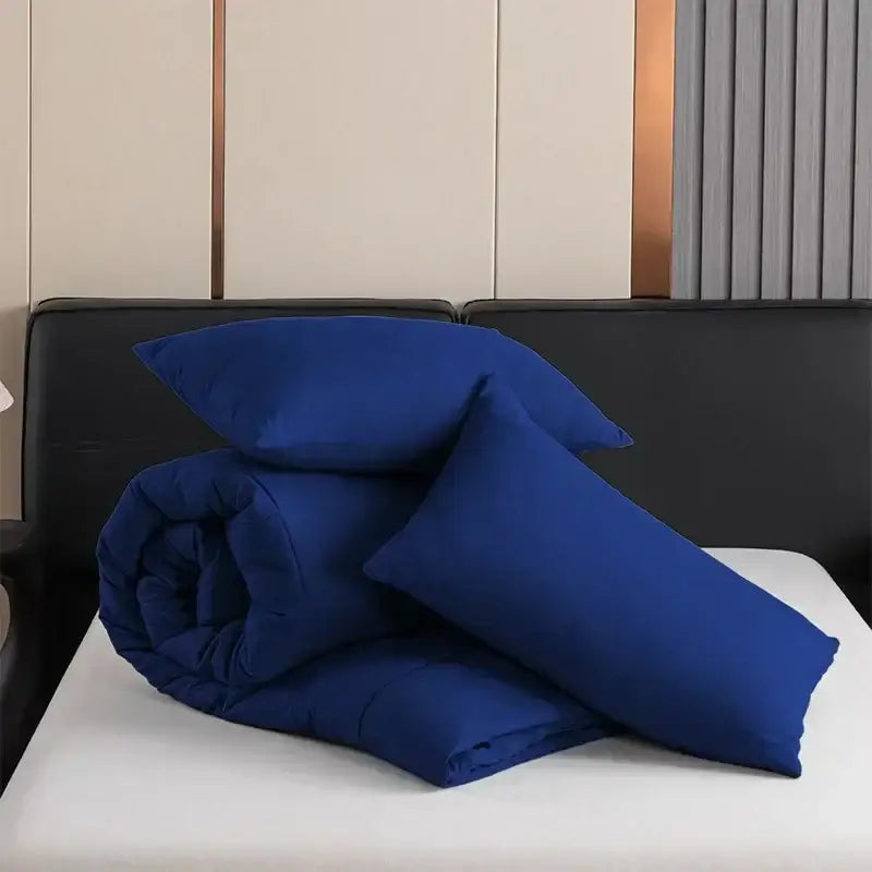 Royal blue quilted duvet set by DecorBites all-season queen and king size comforter with matching pillowcases neatly arranged