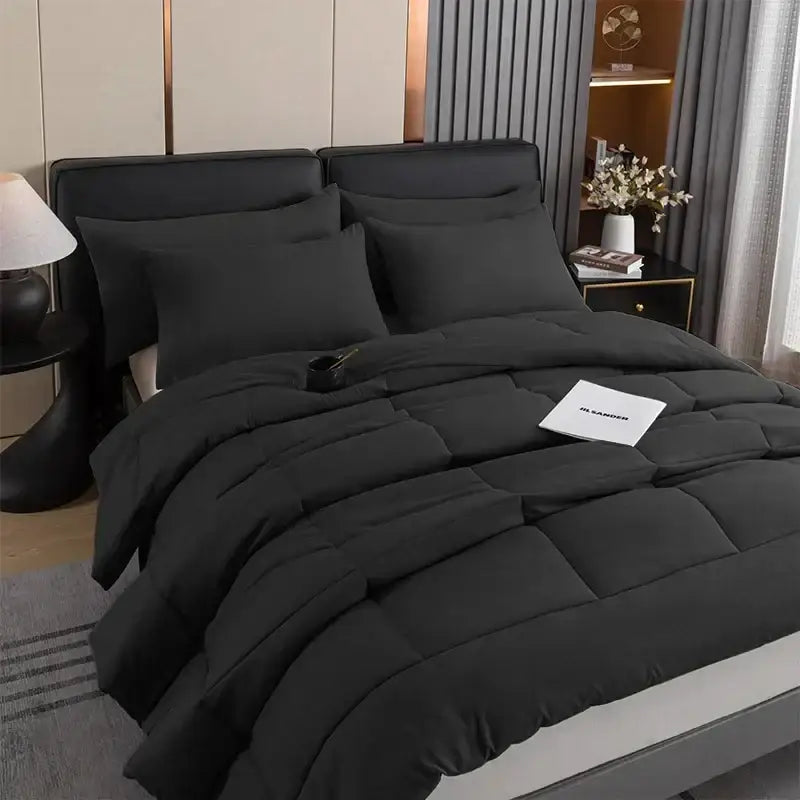 Black quilted duvet set by decorbites with plush soft texture and subtle sheen for all-season comfort