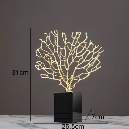 Golden alloy coral crafts with intricate branching design mounted on sleek black crystal base for stylish desktop decor