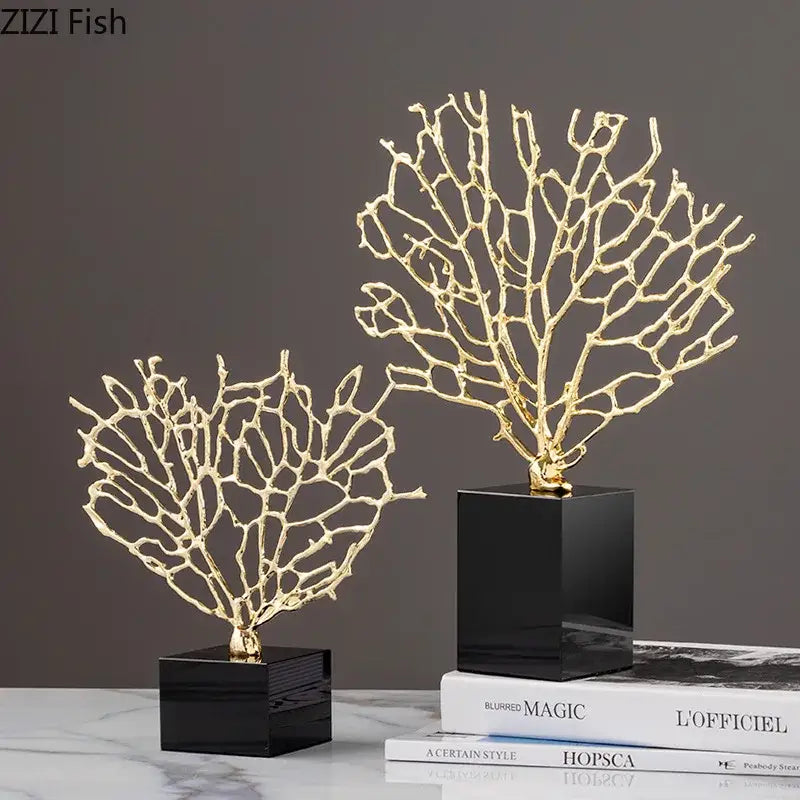 Golden alloy coral crafts with intricate branching designs mounted on sleek black crystal base for stylish desktop decor