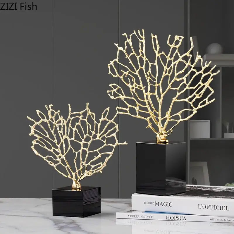 Golden alloy coral crafts with intricate branching on sleek black crystal base for stylish desktop decor
