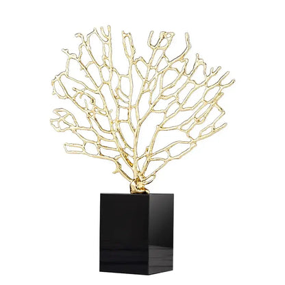 Golden alloy coral crafts with intricate branching design mounted on a crystal base for stylish desktop decor
