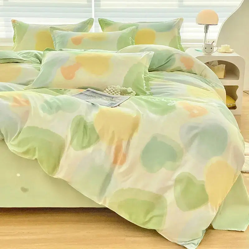 Pastel green and yellow aloe cotton printed bedding set with abstract floral pattern and soft satin finish for adults