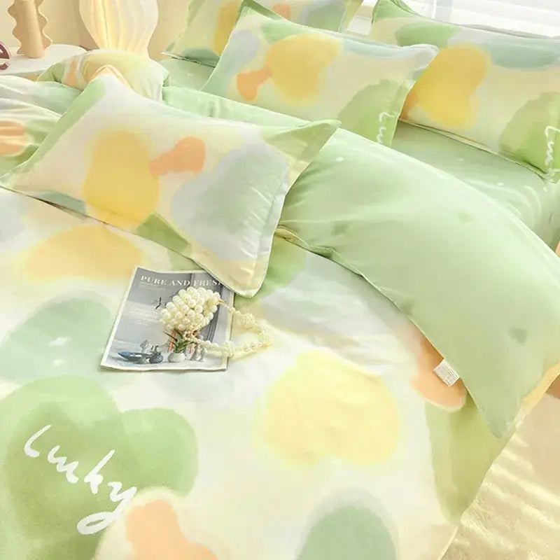 Pastel green and yellow abstract watercolor aloe cotton printed bedding set from DecorBites cotton printed bed collection