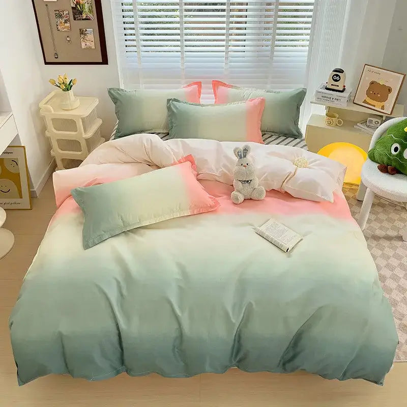 Pastel gradient aloe cotton printed bedding set in smooth satin-like fabric with soft mint to peach color transition