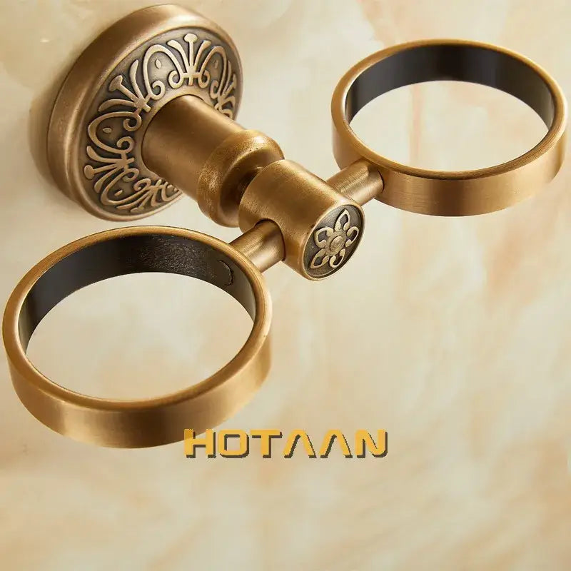 Decorbites™ aluminium double tumbler holder with antique brass double towel ring and ornate floral detailing