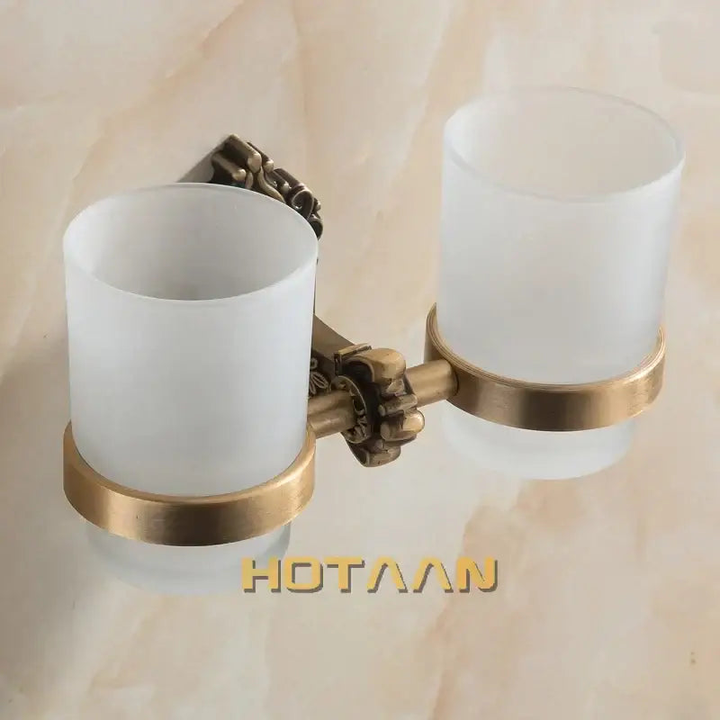 DecorBites™ aluminium double tumbler holder with antique brass finish and frosted glass cups for bathroom use