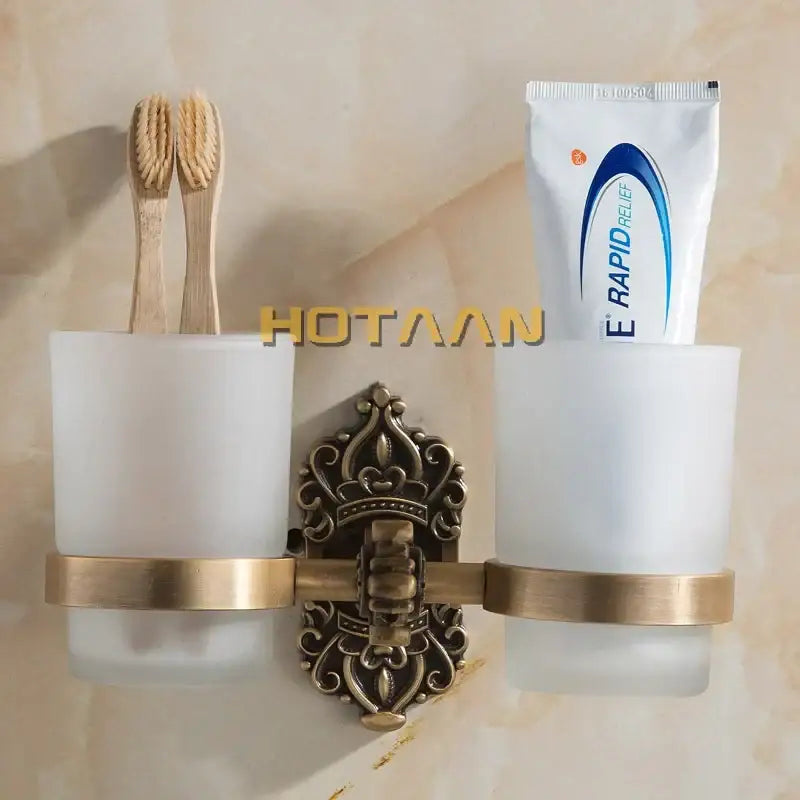 Antique brass-finished aluminium double tumbler holder with frosted glass cups for bathroom use by decorbites