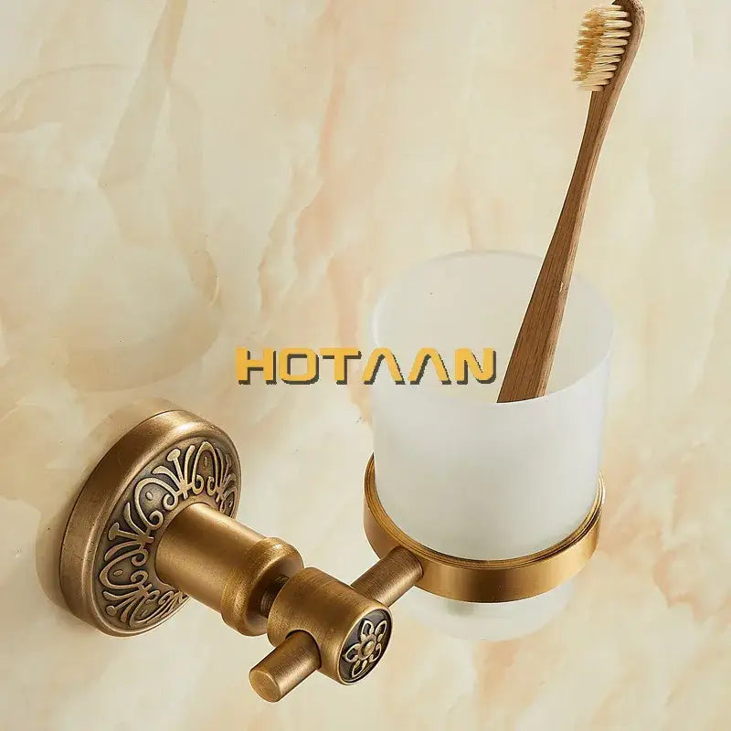 DecorBites aluminium single tumbler holder with antique brass finish cup holder and frosted white glass cup for bathroom use