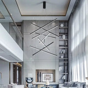 Modern black and white aluminum bar led chandelier with intersecting geometric bars for indoor stair hall lighting
