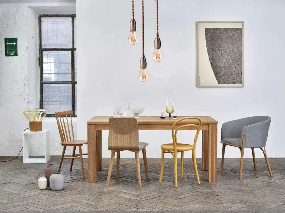 Light wood dining table with matching chairs shown alongside decorbites™ aluminum base e27 lamp holder industrial fixture
