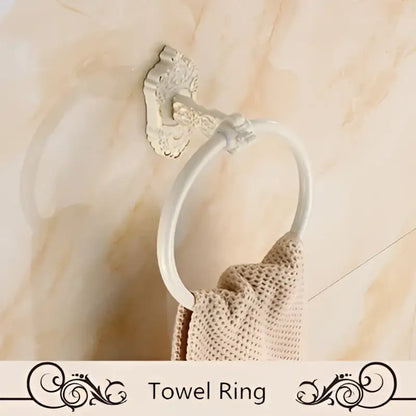White ornate aluminum towel ring with vintage-style wall mount from DecorBites bath hardware set for bathroom use