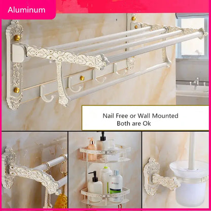 White ornate aluminum towel rack with gold accents and scrollwork from decorbites bath hardware set