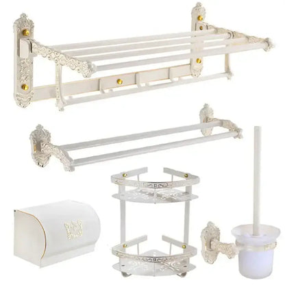 Decorbites aluminum bath hardware set with white ornate design and gold accents including shelf towel rack and hooks