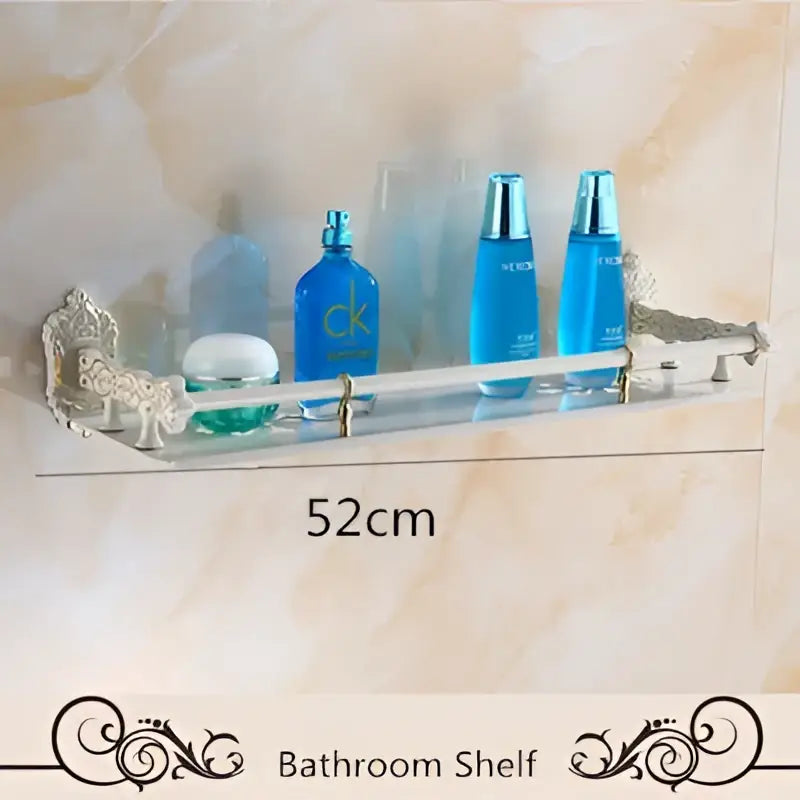 Clear acrylic bathroom shelf with ornate silver aluminum ends and scrollwork from DecorBites bath hardware set