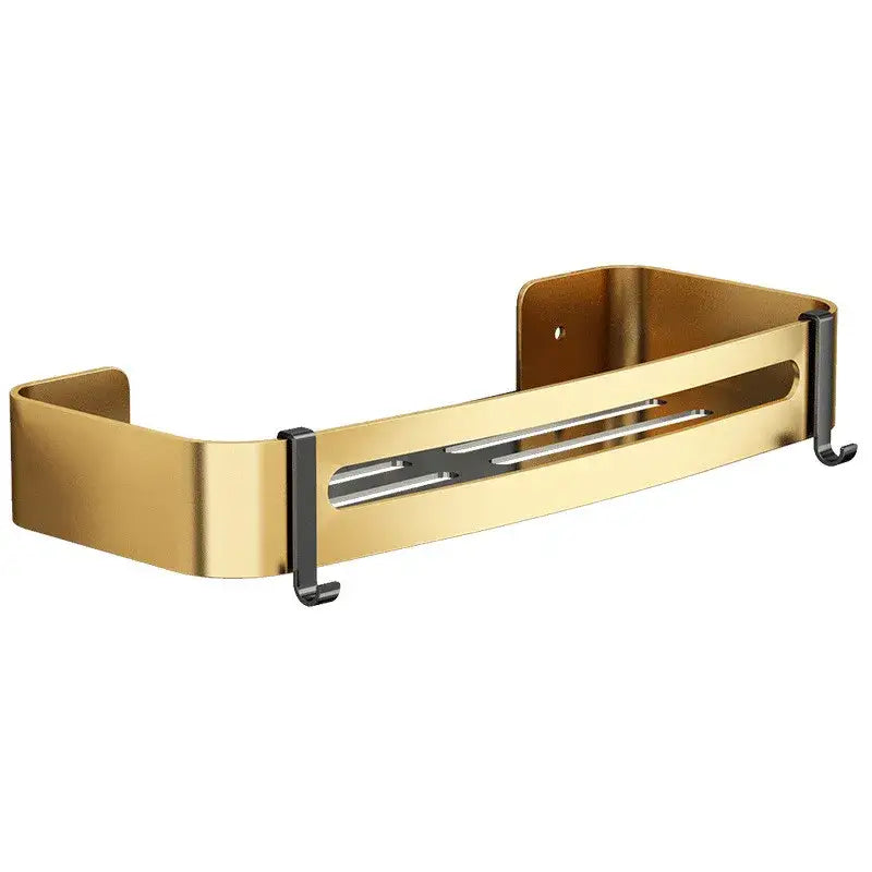 Gold-colored aluminum bathroom corner shelf with black hooks and sleek modern design for shower storage by DecorBites