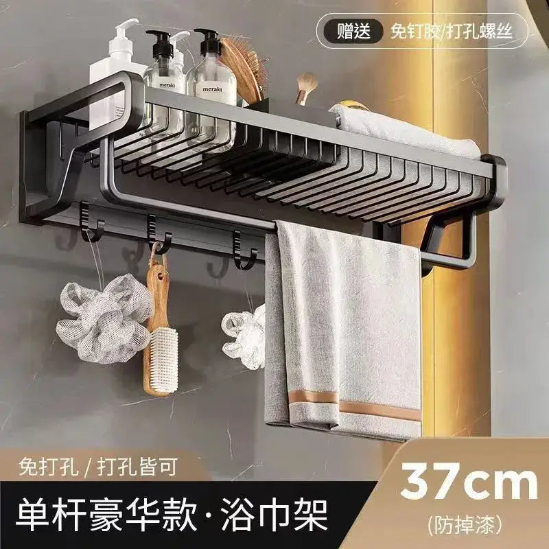 Black aluminum bathroom towel holder with wire mesh storage basket and hooks by DecorBites™ for modern use