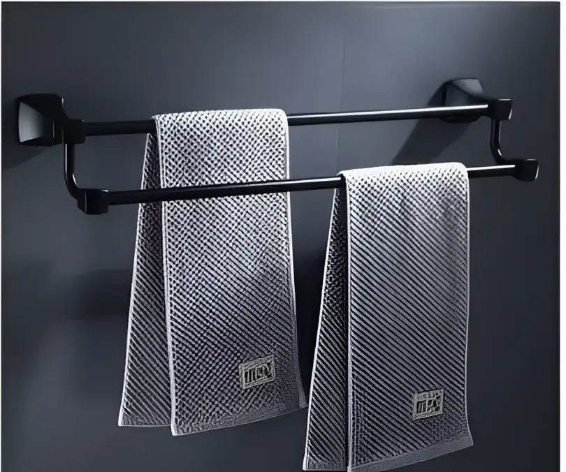 DecorBites™ black aluminum double-bar towel rack with two gray towels from bathroom hardware set
