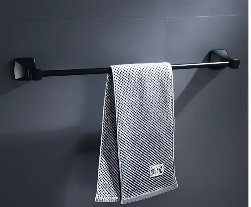 Decorbites aluminum black bathroom hardware set black matte towel rack holding light gray textured towel with label
