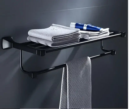 Black metal aluminum towel rack with modern design holding gray towels and toothpaste in bathroom hardware set