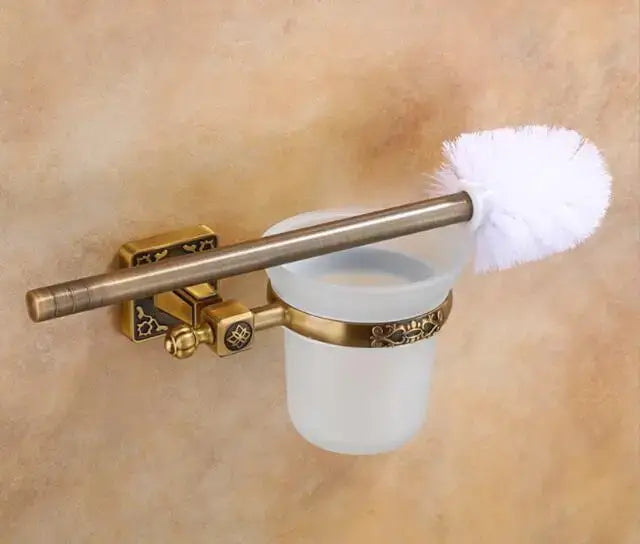 Antique brass-finished aluminum carved toilet brush holder set with frosted glass cup and ornate decorative design