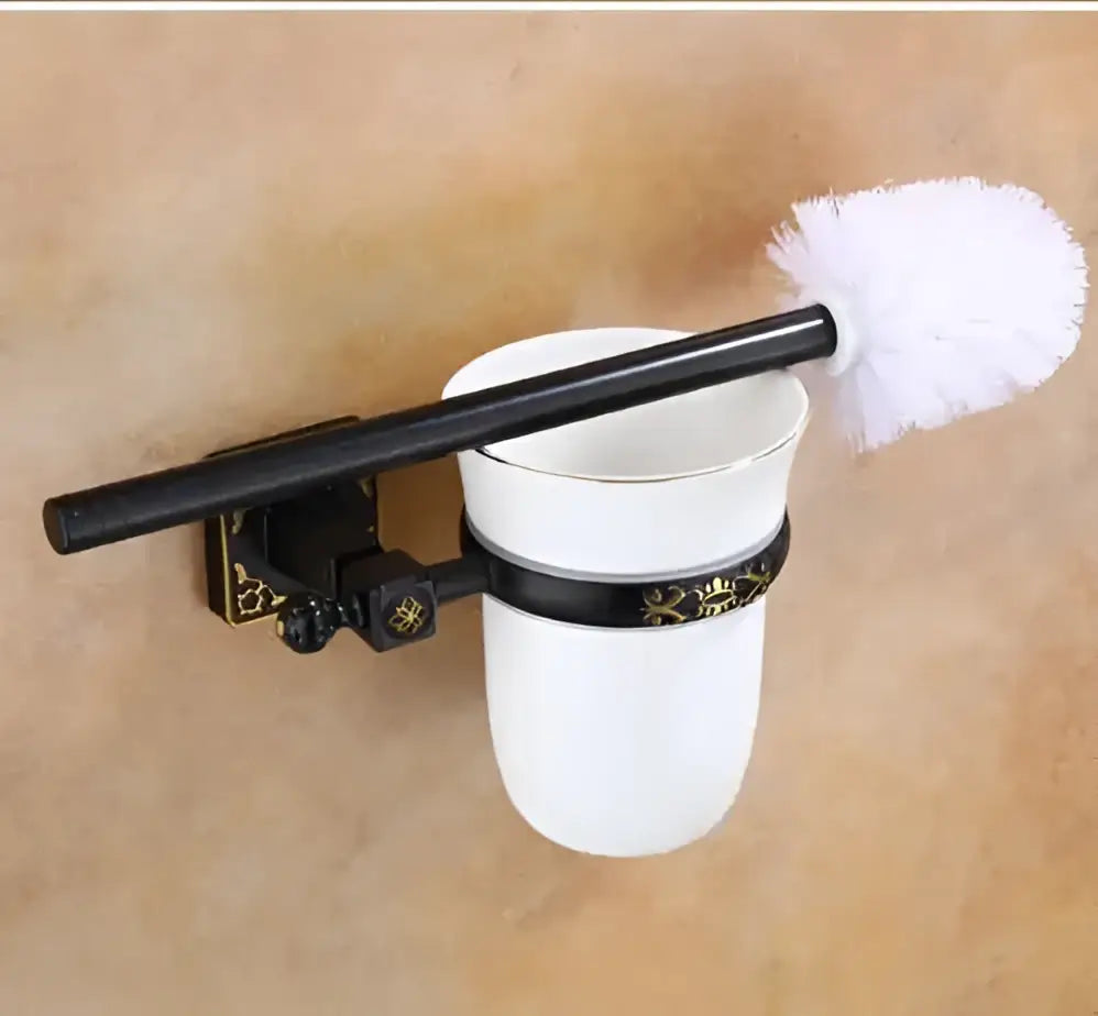 White ceramic toilet brush holder with black ornate aluminum carved bracket from decorbites toilet brush holder set