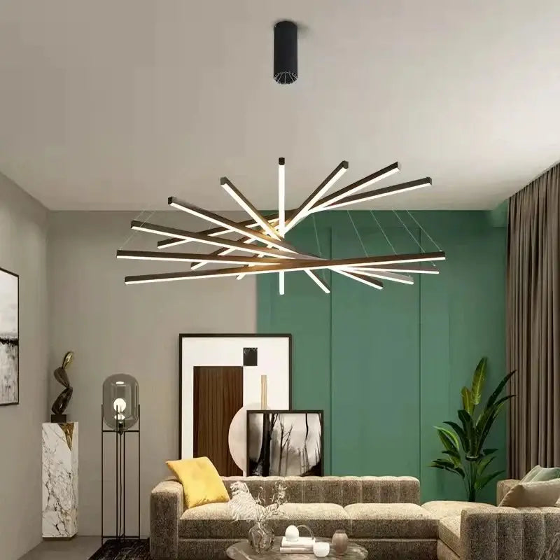 Modern black and white aluminum ceiling chandelier with LED starburst design for high-rise indoor lighting by DecorBites