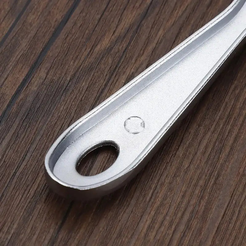 Silver-toned aluminum cheese butter slicer handle with smooth tapered design and oval hanging hole for kitchen use
