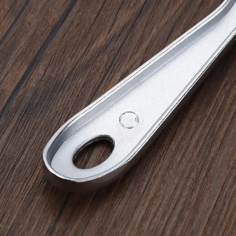 Silver-toned aluminum cheese butter slicer handle with smooth tapered design and oval hanging hole for wire knife baking tool