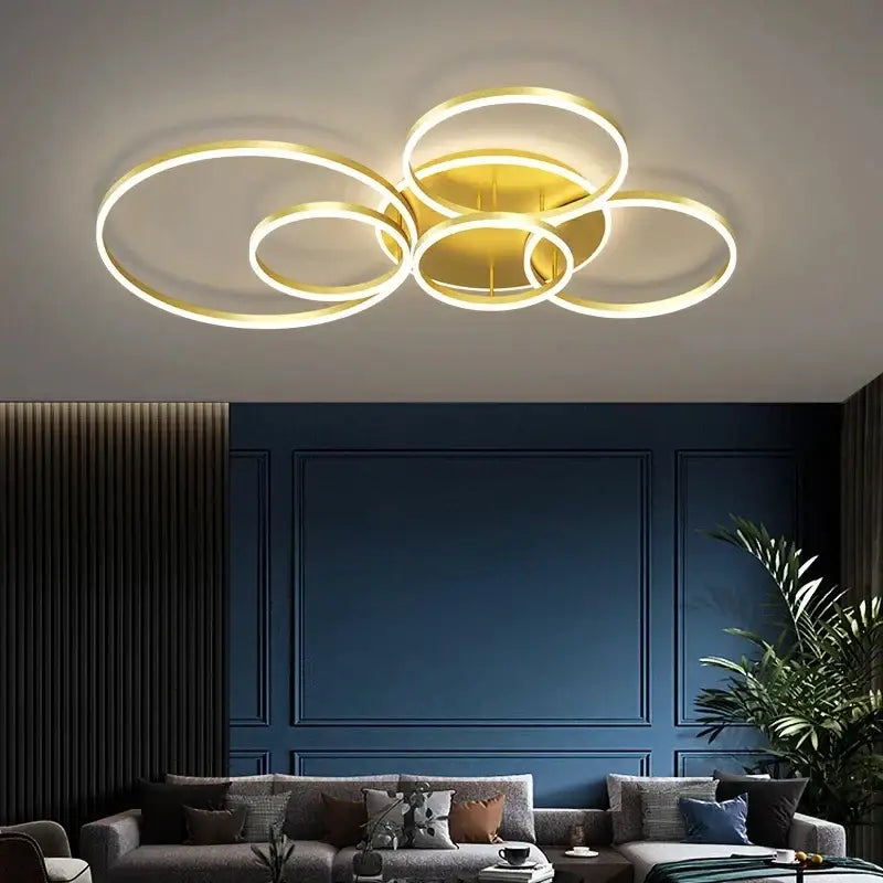 Gold-toned aluminum circle led ceiling light fixture with interconnected rings for bedroom living room kitchen by decorbites