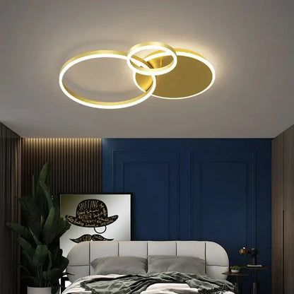 Gold-toned aluminum circle LED ceiling light with interlocking rings for modern bedroom living room kitchen decor