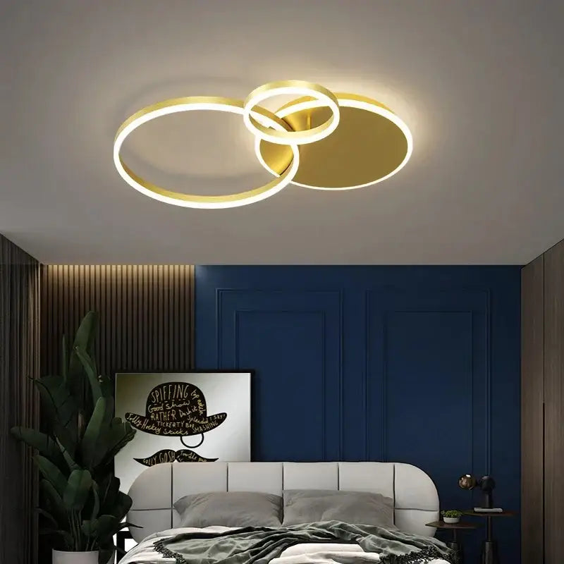 Gold-toned aluminum circle LED ceiling light with interlocking rings for modern bedroom living room kitchen decor