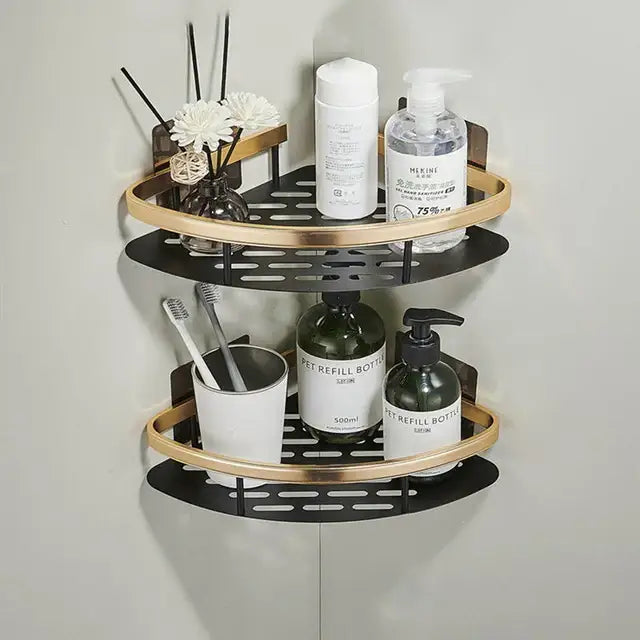 Decorbites™ aluminum corner bathroom shelf in black and gold with modern perforated design and towel holder