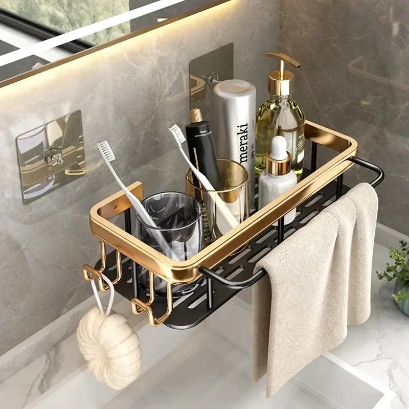 Gold and black aluminum corner bathroom shelf with integrated towel rack and hooks by DecorBites™