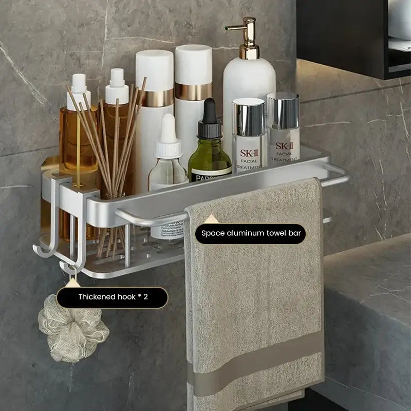 Silver aluminum corner shelf with towel bar hooks and compartments holding skincare products decorbites aluminum corner shelf