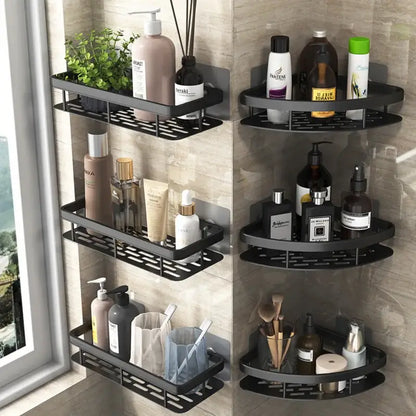 Black metal aluminum corner shower storage rack with perforated design holding bathroom products for efficient corner shower storage