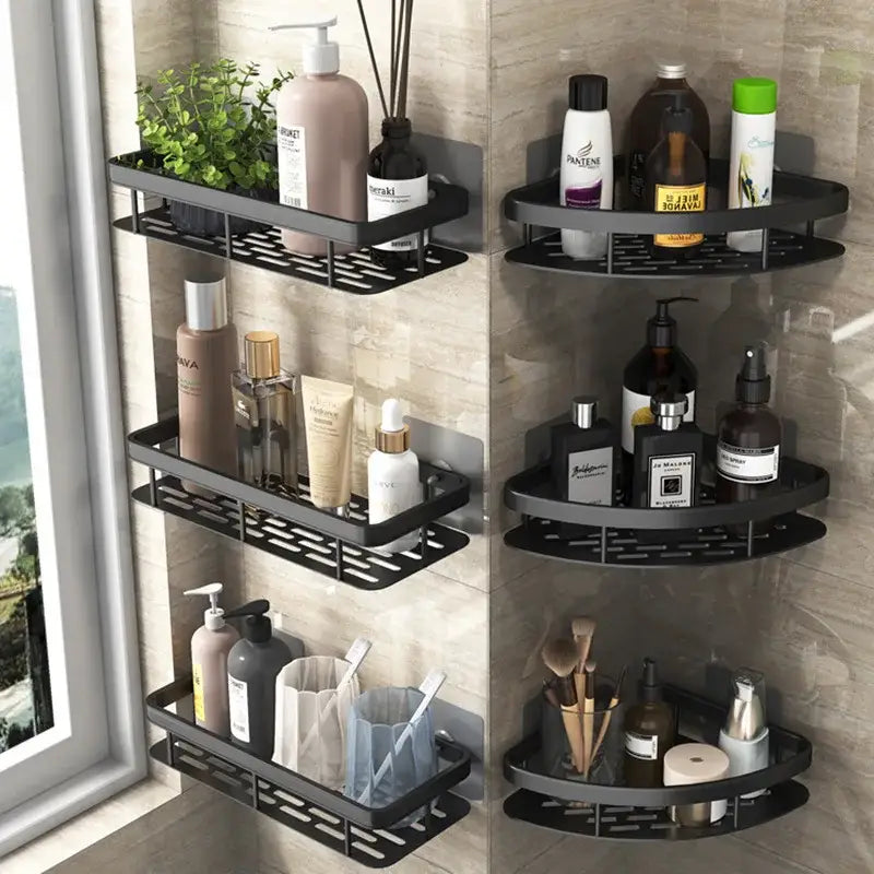 Black metal aluminum corner shower storage rack with perforated design holding bathroom products for efficient corner shower storage