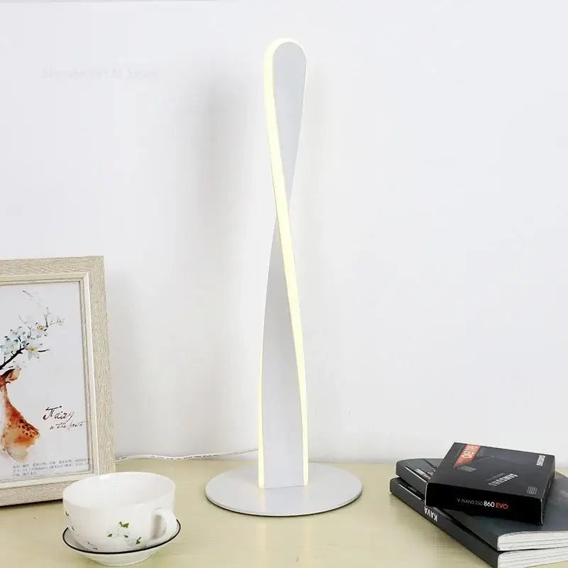 Modern white aluminum floor lamp with sleek twisted design and dimmable led light strip by decorbites