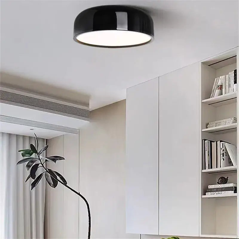 Decorbites™ aluminum led ceiling lamp in black with glossy round design and white illuminated center for modern spaces