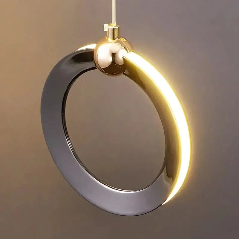 Decorbites™ aluminum led chandelier featuring a polished gold and matte black circular ring with integrated glowing led strip