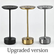 Three sleek decorbites aluminum led desk lamps in black gold and silver with textured midsections for living room use