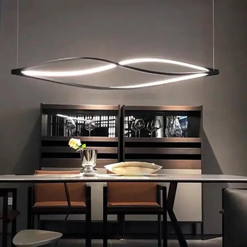 Modern black aluminum led pendant lamp with sleek curved design and glowing white led strip for kitchen island lighting