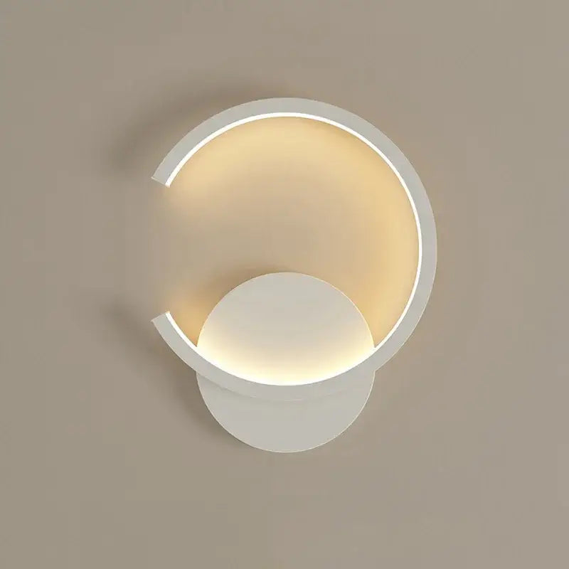 Modern white aluminum led wall lamp DecorBites™ with sleek curved design and warm ambient lighting for home use