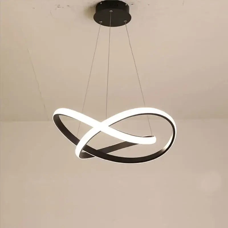 Modern DecorBites™ aluminum line pendant light with sleek black and white infinity rings for dining room illumination