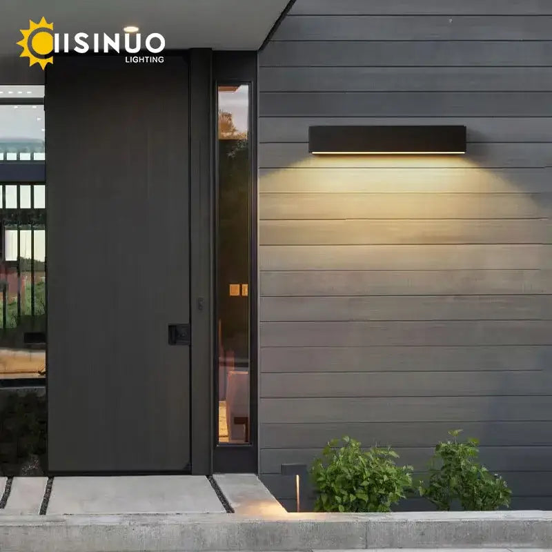 Decorbites™ black aluminum outdoor wall sconces with sleek modern design emitting warm ambient lighting