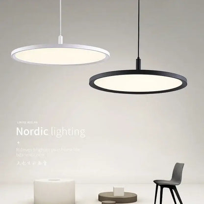 Two minimalist decorbites aluminum pendant lights in white and black with round led ring design for home and hotel use