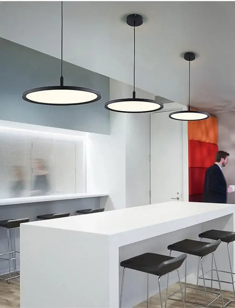 Three sleek black DecorBites aluminum pendant lights with matte finish for home, hotel, restaurant, and bar ceilings