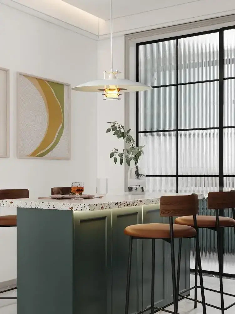 Modern white decorbites aluminum pendant lights with warm glowing bulb and sleek metallic accents for kitchen island