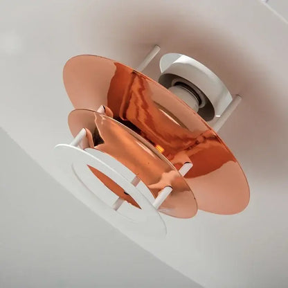 Copper-colored layered disc-shaped decorbites aluminum pendant light with white base for kitchen island pendant lights